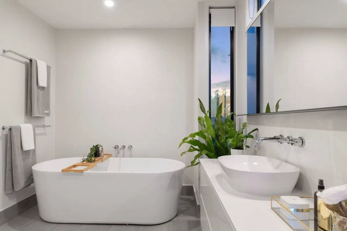 Space-saving small bathroom design with wall-hung fixtures and light colour palette