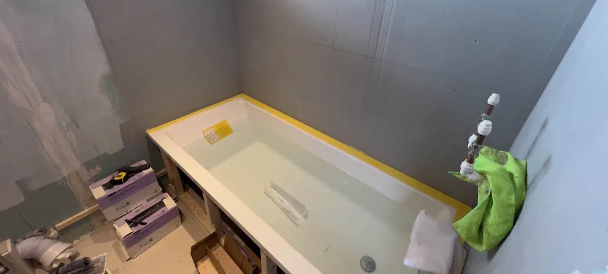 Mapei waterproofing membrane and tanking applied around the bath area