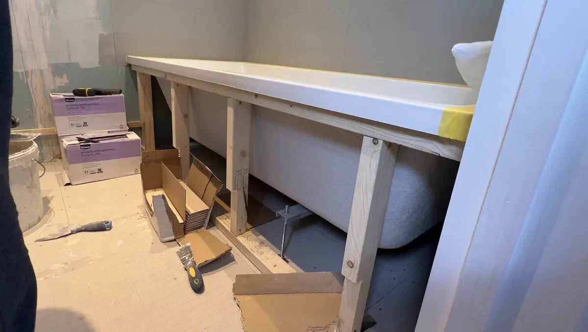 Custom timber bath support frame built for a secure acrylic bath installation