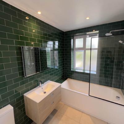 green bathroom tiles - bathroom renovation by builders squad in Didsbury Manchester